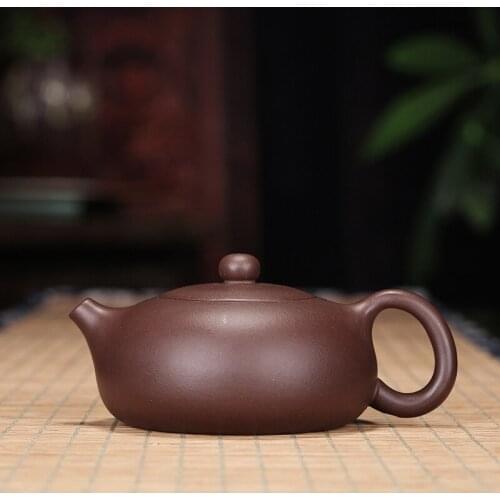 Purple teapot by hand purple clay ball Kong Bian hand-painted yixing daily provisions wholesale tea pot a undertakes