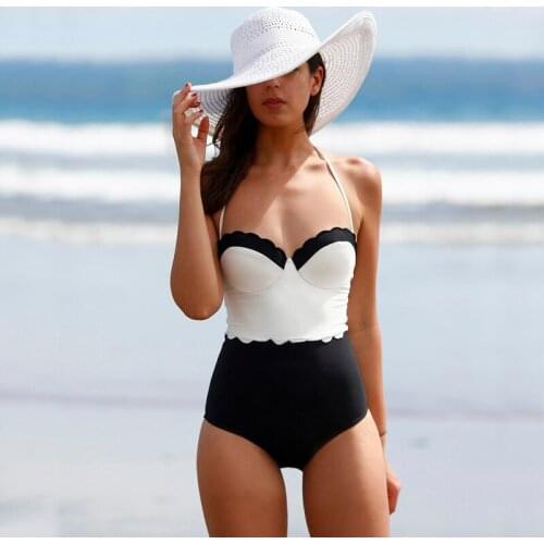The new Europe and the United States sell like hot cakes hot style black and white swimsuit bikini swimsuit conjoined high kidne