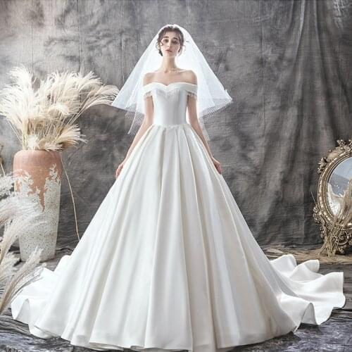 Robe De Soirée De Mariage Boat Neck Tassel Ball Gown Wedding Dresses Plus Sizes Suknia Slubna Satin Vintage Vestidos De Novia