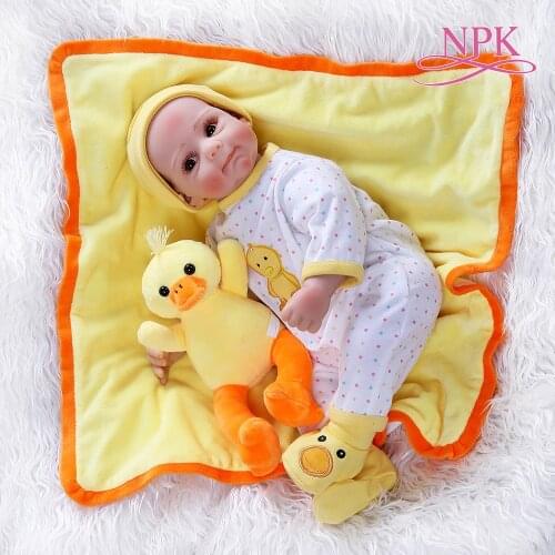 52CM newborn sweet baby face lifelike bebe doll reborn baby yellow duck dress soft cuddly baby high quality collectible doll