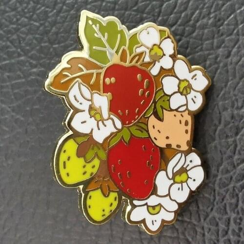 A cluster of strawberries brooch