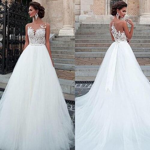 Charming Tulle Wedding Gowns Sleeveless O-Neck A-Line Dresses with Appliques Sexy Illusion Design Bridal Gowns Cheap