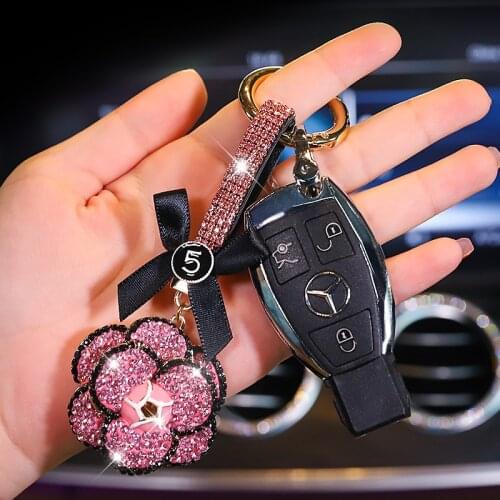 Creative car keychain cartoon cute lady bag pendant jewelry small accessories fashion camellia diamond car keychain pendant gift