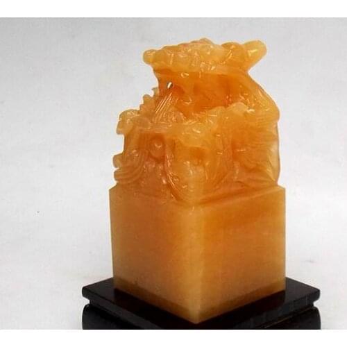 Fine jade rice Topaz Panlong hand-engraved bottom 5 cm