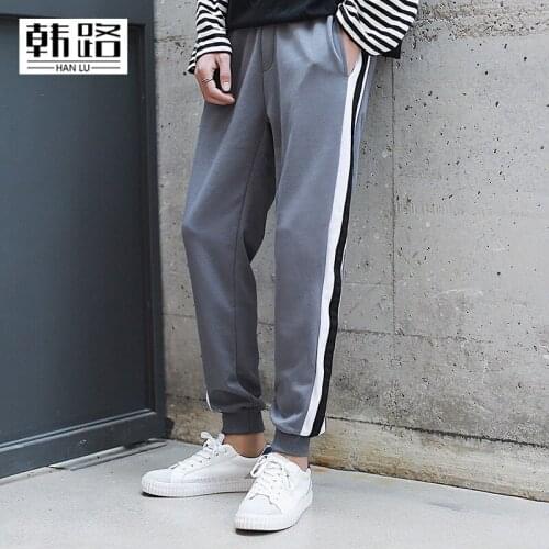 Fashion mens Sweatpants New men preppy style Pencil pants Side stripe design loose pants male Elastic waist drawstring trousers