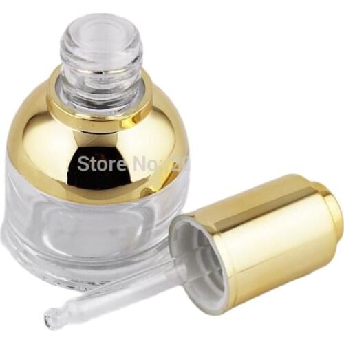 NEW ARRIVAL 30ml transparent glass dropper bottle with gold shoulder and gold press dropper ,white bulb glass bottle