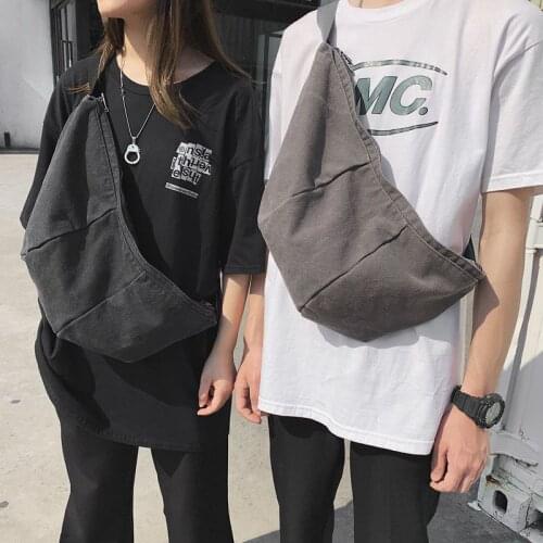 2021 new Japanese ins street canvas messenger bag for men and women jiaozi backpack students large-capacity chest bag