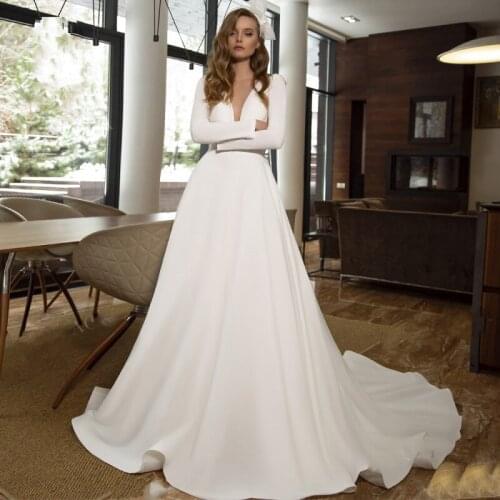 Modern Simple Ivory Long Sleeves Bridal Wedding Dresses A Line V Neckline Illusion Buttons BackWedding Gowns for Bride On Sale