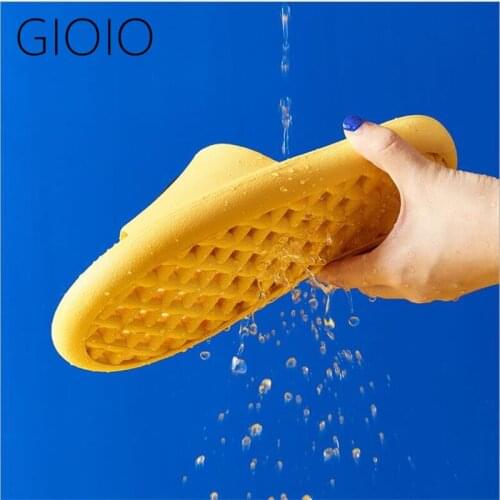 Summer 2021 couple indoor home parent-child smiley fashion bathroom slippers leaking bath non-slip EVA sandals and slippers