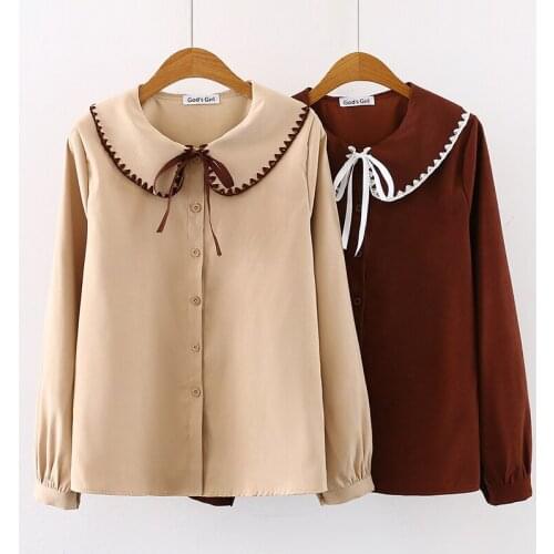 Pure color shirt women 2020 autumn new French style retro round neck doll tie single breasted long sleeve bottoming top women