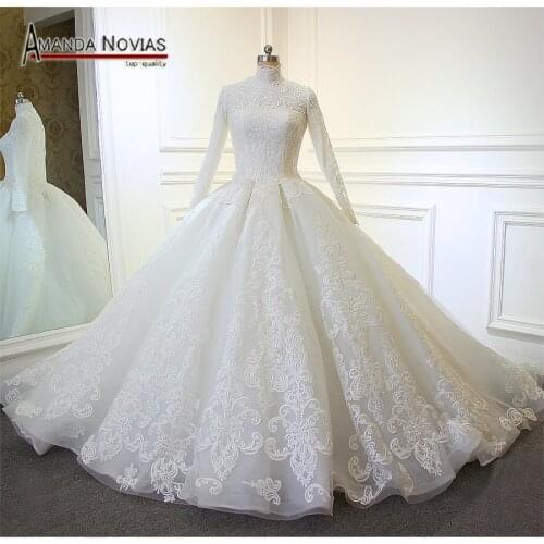 Hot Sale Long Sleeve Lace Appliqued Puffy Ball Gown Wedding Dress 2019 Muslim
