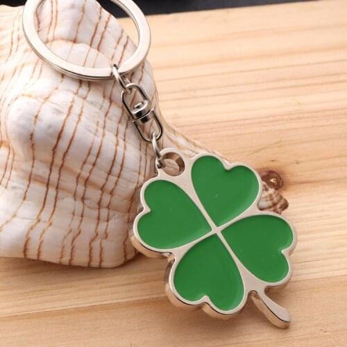 Stainless steel high quality green four-leaf clover key chain fashion creative student bag metal epoxy jewelry lucky key chain