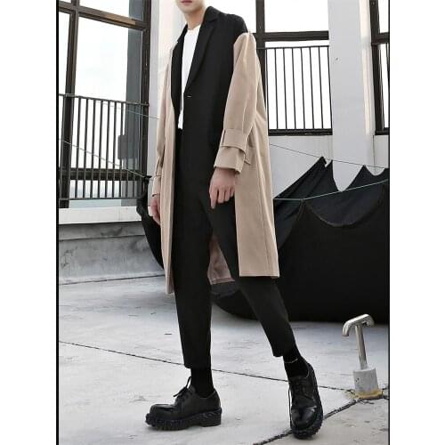 Mens new irregular color splicing design in the long windbreaker coat couples with the same leisure large size windbreaker