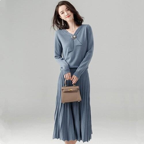 Sweater suit temperament fashion suit womens dress autumn and winter new knitted two-piece head Slim sweater skirt suit