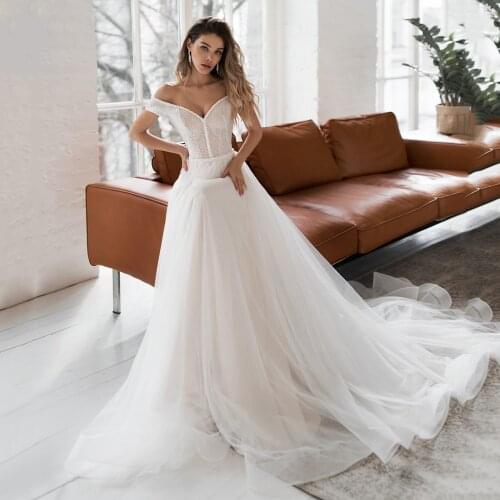 UZN Elegant A-Line Wedding Dress V-Neck Off The Shoulder Short Sleeves Glitter Tulle Bridal Gown Sexy Beading Brides Dress
