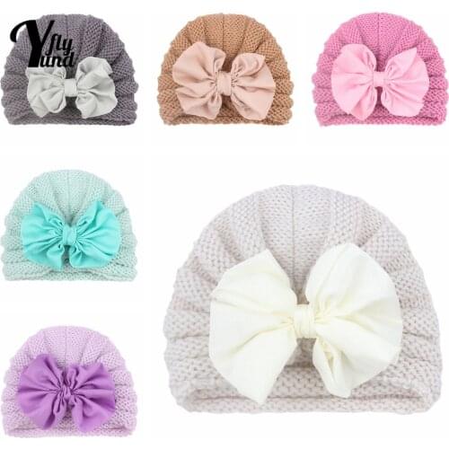 Yundfly Autumn and Winter Fashion Warm Knitting Wool Cap Solid Color Handmade Bowknot Newborn Hats Striped Headwear Holiday Gift