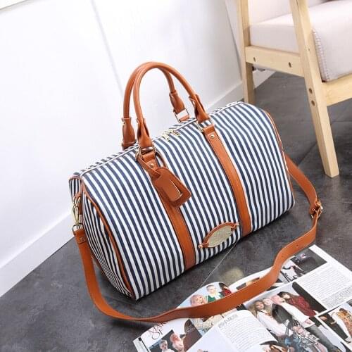 New waterproof canvas travel bag, leisure stripe printing, portable female bag, fashion storage travel bag