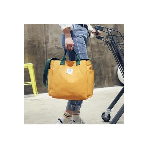 The new Japanese purchasing hit color hand canvas bag fashion cloth oblique cross bag