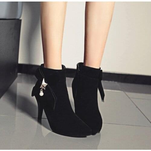 Autumn and winter 2021 new belt buckle pointed high heels womens thick heel Martin boots European and American commuting boots