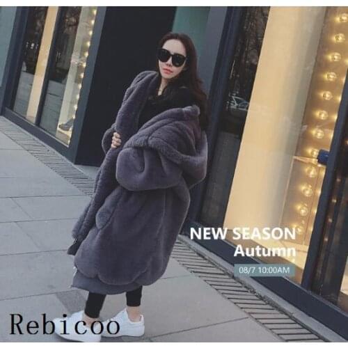 New Plus Size Winter Coats Women Solid Color Casual Loose Fur Jacket Big Fur Hooded Overcoats Fashion Thicken Faux Fur Coat