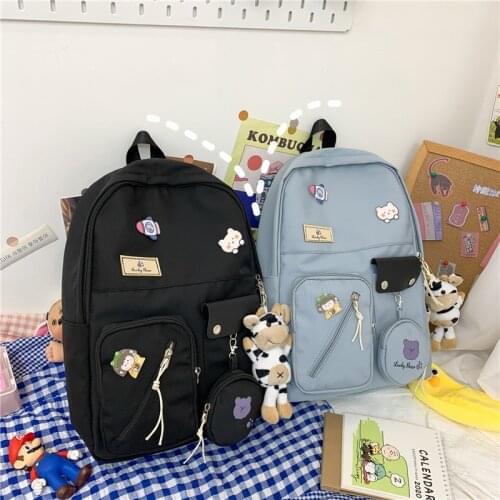 Fashion Womens Backpack Cute Doll Solid Color Nylon Waterproof Schoolbag For Girls Large Capacity Backpack With Many Pockets