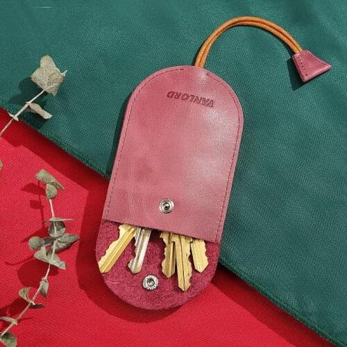 Womens leather ultra thin key bag creativity South Korea cute pull type mini small general motors key bag man