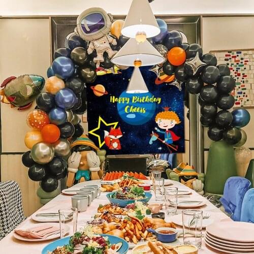 Space themed birthday party decorations, disposable party cutlery, balloon decorations