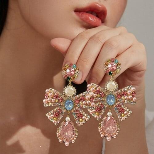 MENGJIQIAO Korean Luxury Pink Rhinestone Bowknot Drop Earrings For Women Fashion Waterdrop Crystal Pendientes Party Jewelry