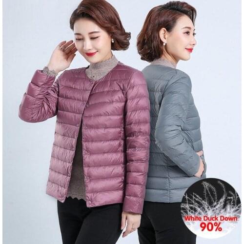 Solid color long sleeve round neck Lightweight down jacket women 90% Duck down Button placket Winter tank Warm Coat For woman