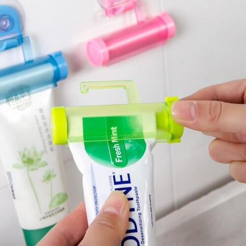 1PC Multifunction Rolling Tube Squeezer Toothpaste Dispenser Sucker Holder Hanger Gadget Bathroom Accessories