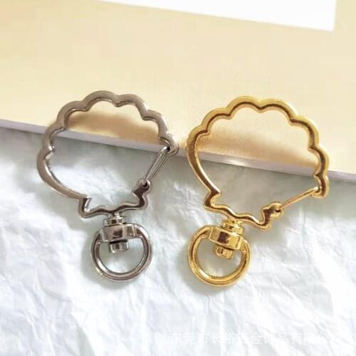 Metal shaped buckle acrylic pendant dog buckle spot plum fan parachute shell keychain