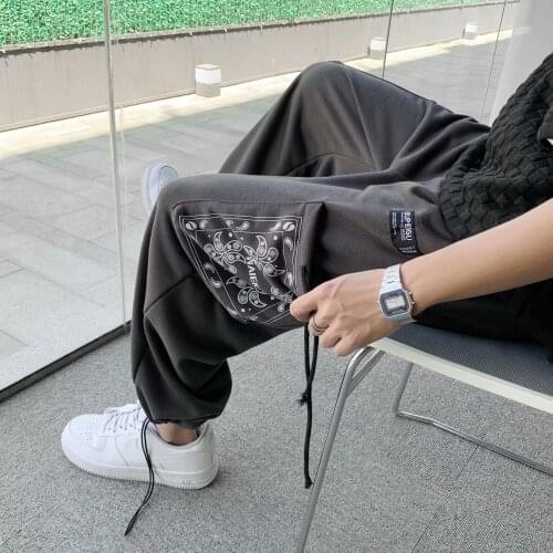 Summer new casual pants jogging mens cashew flower big pocket 2021 wind tie leg pants trend sports pants M-2XL