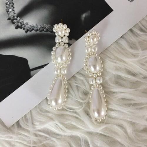 The same hand-woven high-end pearl earrings earrings, all-match temperament