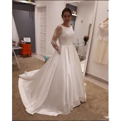 Long Sleeves Lace Wedding Dresses With Pockets O-Neck Button Back Sweep Train Satin Bride Gowns Vestido De Noiva 2020 Customized