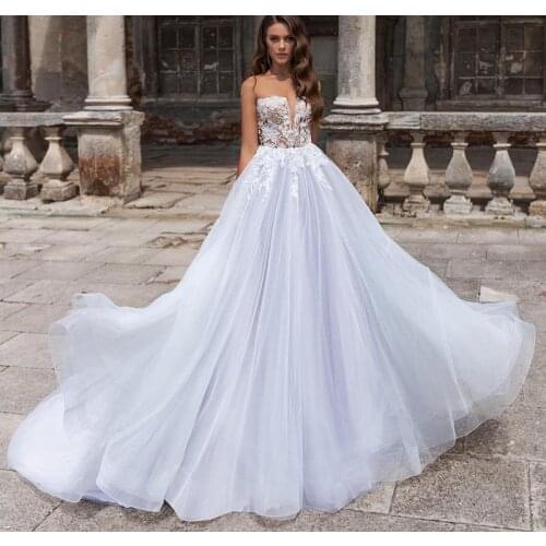 Boho Shinny Wedding Dress 2020 Princess Bride Dresses Appliqued Wedding Gowns Illusion Back Vestido De noiva