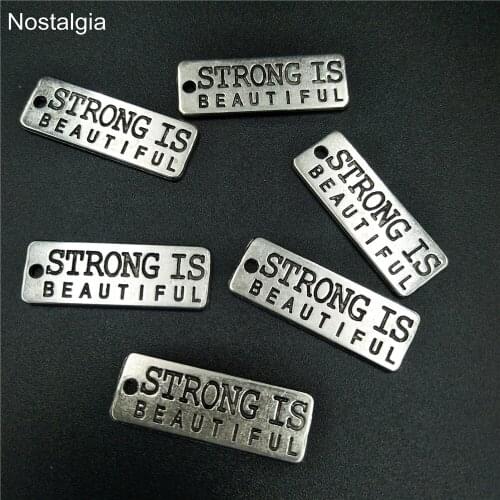 Nostalgia 10Pcs Strong Is Beautiful Inspirational Charms Fitness Message Stamped On Rectangle Tag Pendant 10*28MM