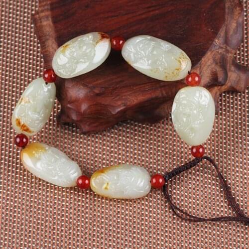 Xinjiang and Tian Yucai God bracelet and Tian Yu seed raw stone with red-skinned caishen jade hand string attached certificate