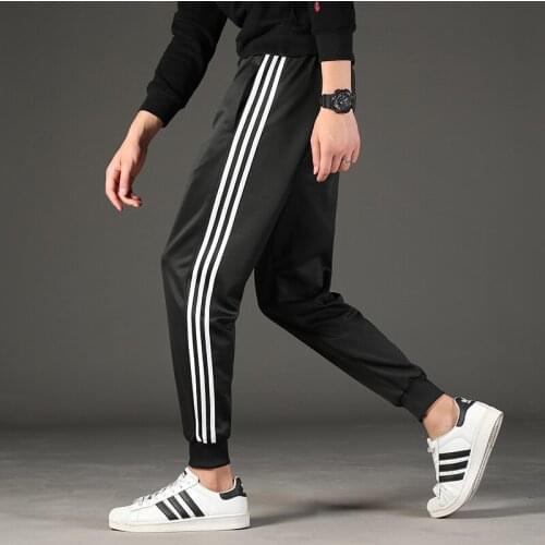 Mens casual pants mens slim fit Korean fashion spring fashion brand versatile legged casual sports pants
