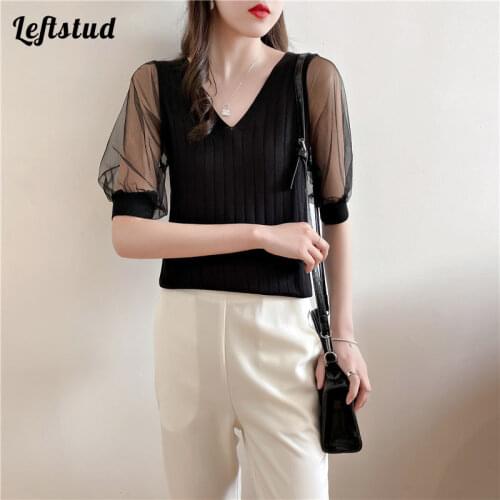 Sexy low V-neck T-shirt female black summer new style Korean fashion design sense mesh stitching puff sleeve stretch knit top