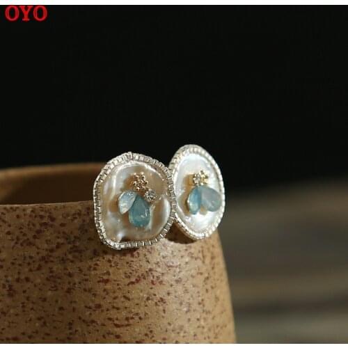 Shaped pearl disc bezel with zircon inlaid simple and fashionable silver earrings