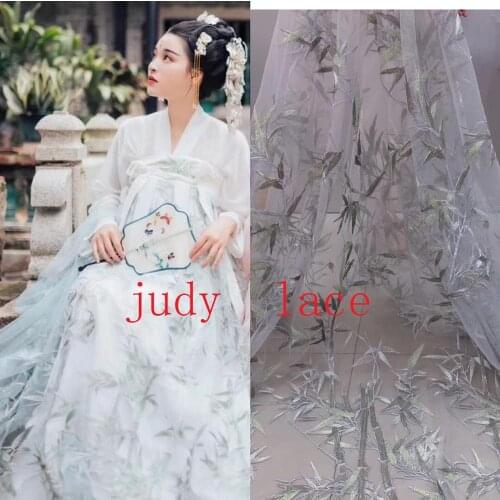 3-colour embroidered sequin bamboo pattern fabric is used to add beads to chinese-style wedding gowns for dinner parties