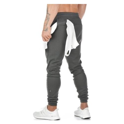 Mens Casual Pants Fitness Men Sportswear Tracksuit Bottoms Skinny Sweatpants Trousers Black Gyms Track Pants Size M-XXXL