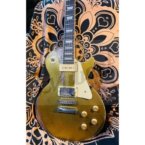 Customized electric guitar with relic way finished, with crack line on body top and wear off .cream pickguard,old aged parts