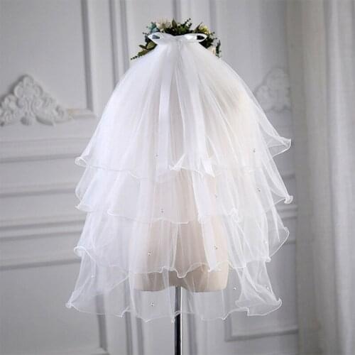 4 Tier Wedding Bridal Veil with Comb Embellished with Pearls Bow Ribbon Adornment Fingertip Length Curly Edge Tulle Veil