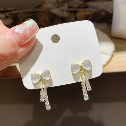 Fairy Shiny Opal Bowknot Tassel Earrings for Women Gold Color Alloy Shiny Rhinestone Cross Knotted Dangle Earrings Party Jewelry