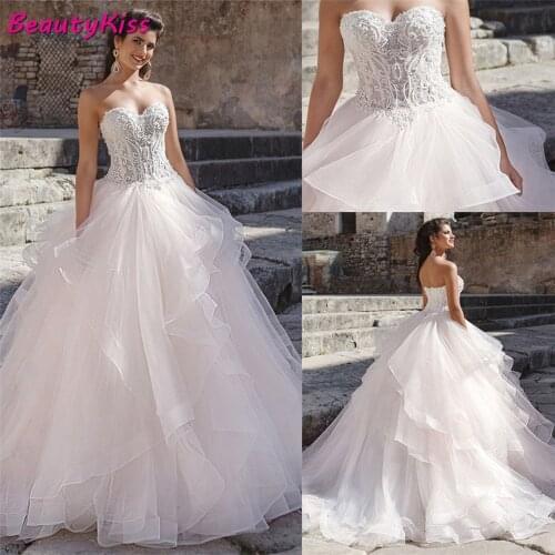 Luxury Sweetheart Ball Gown Wedding Dresses 2020 Lace Appliques Puffy Princess Bridal Gowns Custom Made Robe De Marie