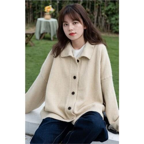 Autumn and winter fashion new Korean version of long-sleeved lapel solid color cardigan sweater women loose knit top coat