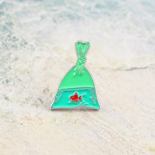 Creative Green Fish Bag Brooch Fishing Net VERAMEAT Goldfish Enamel Pin Denim Sweater Badge Kids Ocean Dream Punk Gifts
