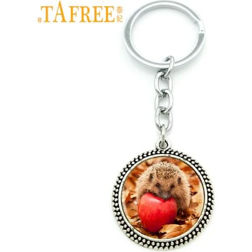 TAFREE hungry Hedgehog Key Chain it eats fruit in picture Fashion Keychain round Glass very cute style metal jewelry H251