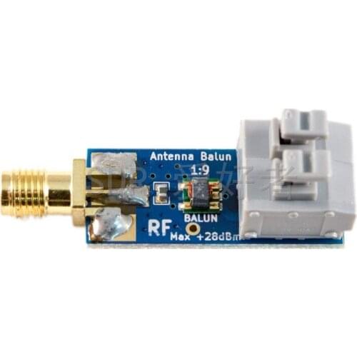 Miniature 1:9 HF antenna balun